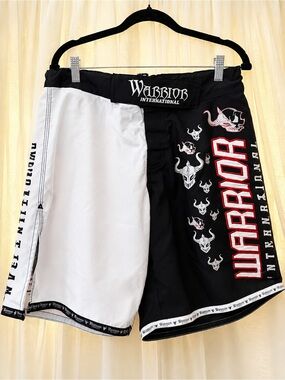 Warrior International Men’s Black & White Athletic Shorts with Red Logo